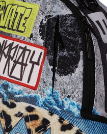 Sac à dos - PATCHWORK PUNK DLXR BACKPACK - SPRAYGROUND-Magna-Carta