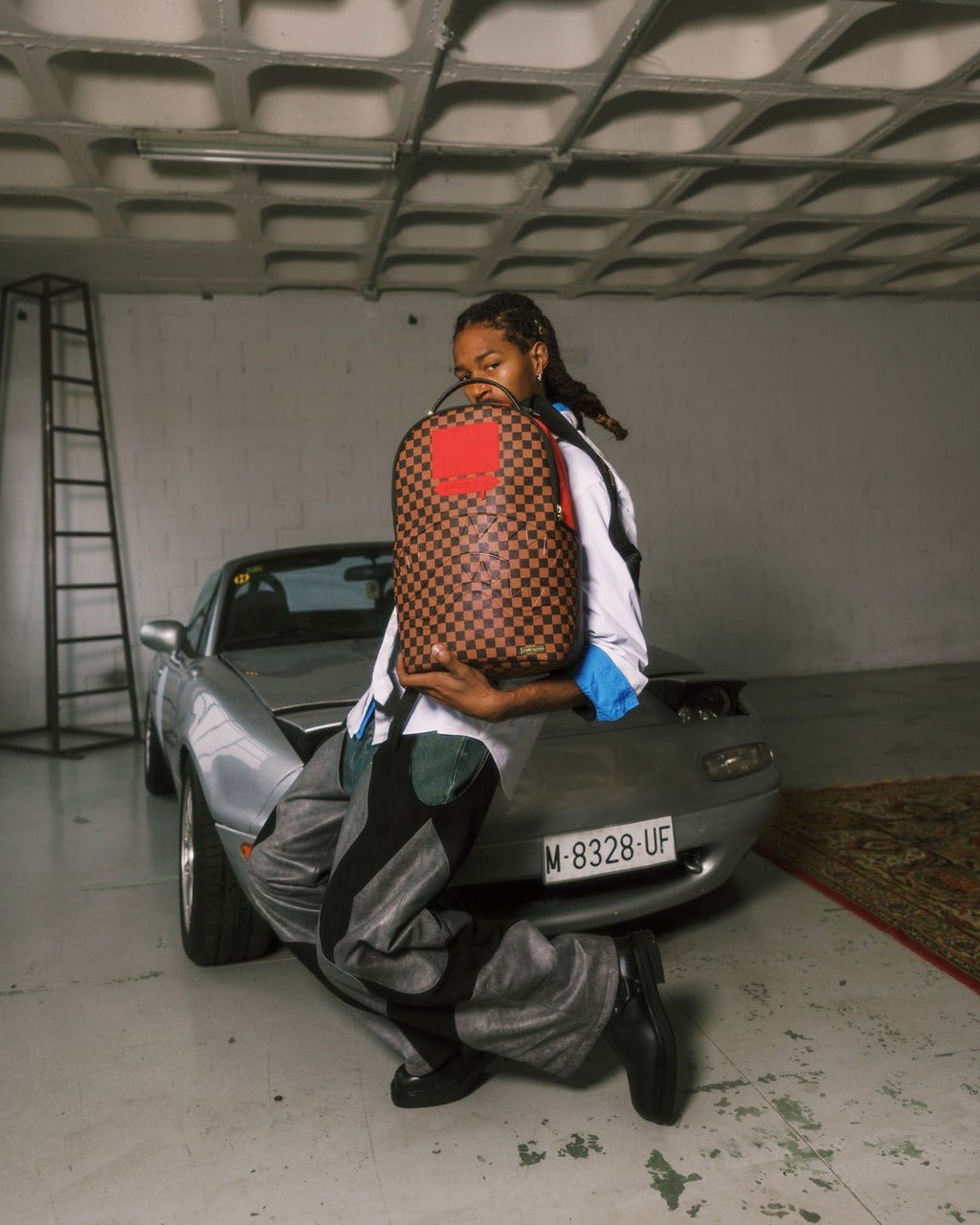 Sac à dos - RED REDEMPTION DLXSV BACKPACK - SPRAYGROUND-Magna-Carta