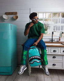 Sac à dos - SHARK CENTRAL AQUA DLXSV BACKPACK - SPRAYGROUND-Magna-Carta