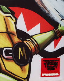 Sac à dos - TMNT MUTANT MAYHEM MIKEY DLXR BACKPACK - SPRAYGROUND-Magna-Carta